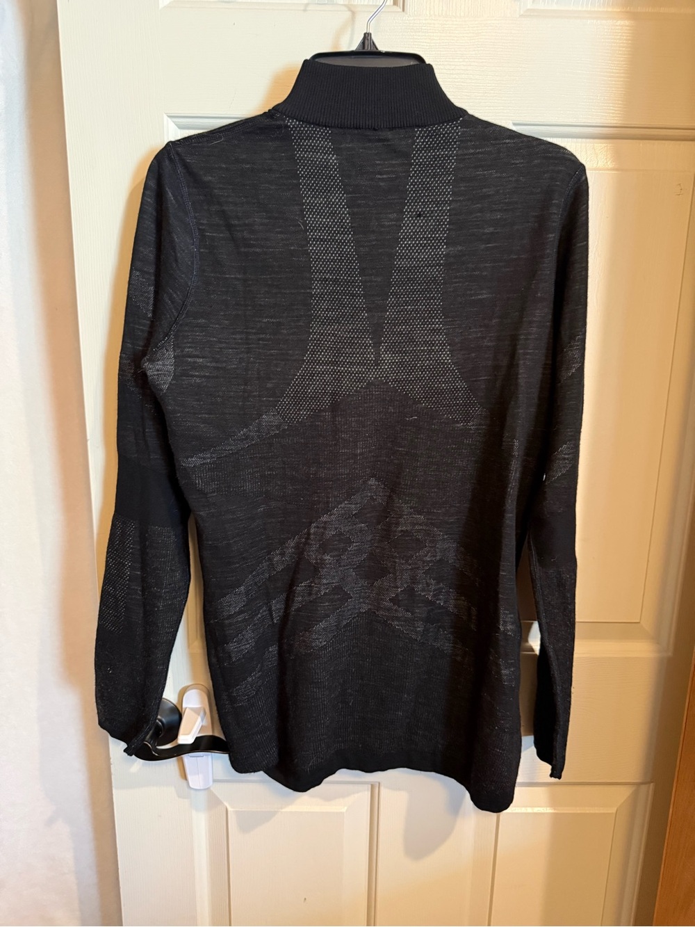 Smartwool Black Long-Sleeve sweater. SEE CALLOUTS